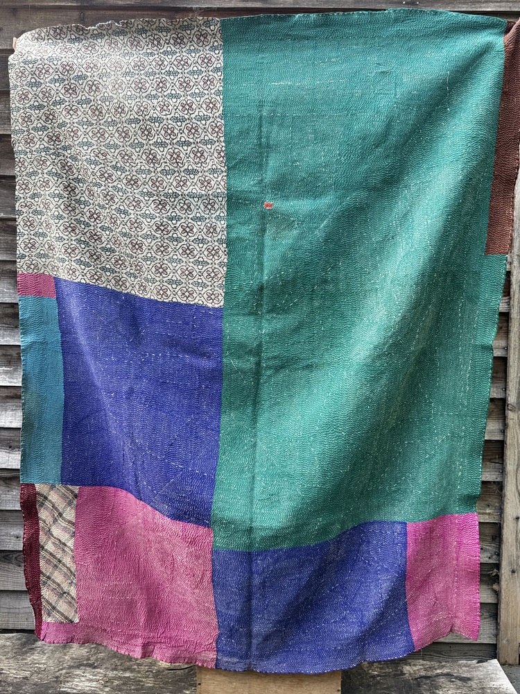Exquisite vintage Kantha quilt featuring authentic hand-stitched Indian patchwork, responsibly sourced and perfect as unique homeware.