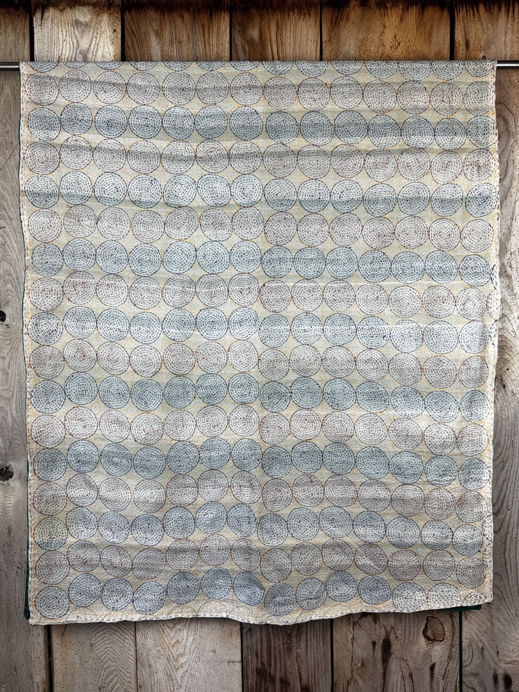 Silk scarf made from hand-stitched recycled sari silk.