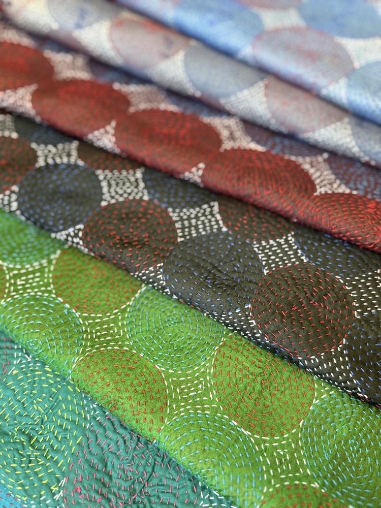 Silk scarf made from hand-stitched recycled sari silk.